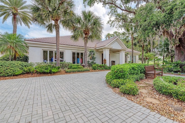 view of front of home featuring stucco siding