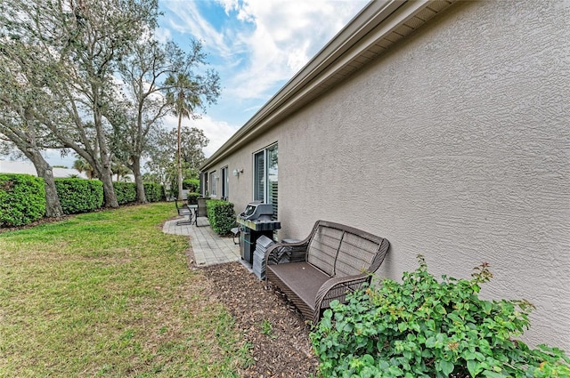 view of yard with a patio area and fence