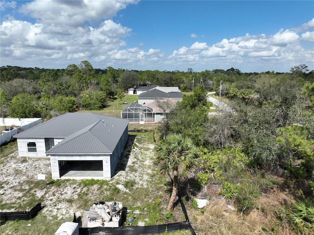 bird's eye view with a view of trees