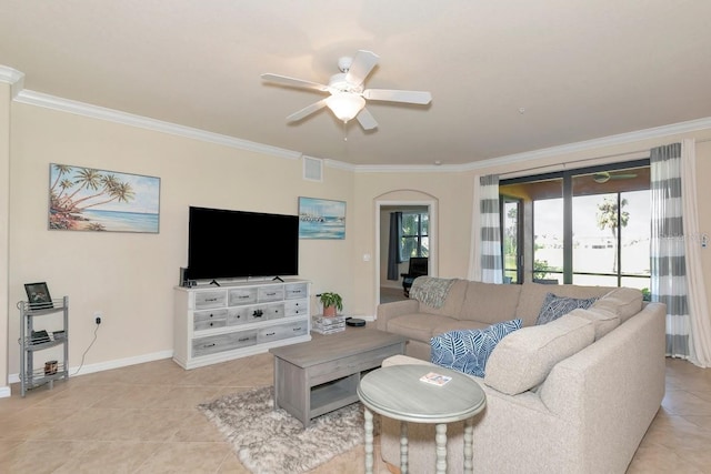 living room with ornamental molding, visible vents, ceiling fan, and light tile patterned flooring