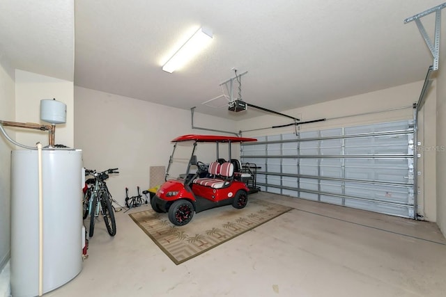 garage featuring gas water heater and a garage door opener