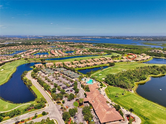 bird's eye view featuring a water view and golf course view