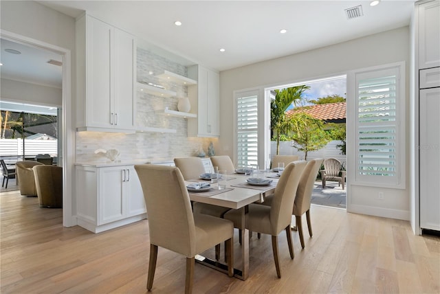 5103 Windward Ave, Sarasota, FL 34242 - dining room featuring light wood-style floors and recessed lighting
