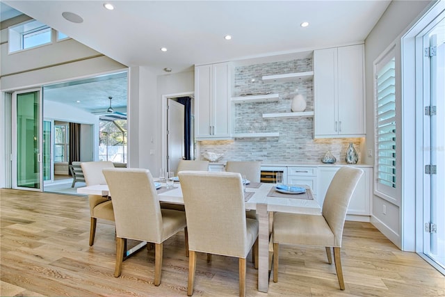 5103 Windward Ave, Sarasota, FL 34242 - dining room with light wood finished floors, healthy amount of natural light, recessed lighting, and beverage cooler