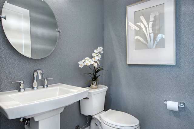 5103 Windward Ave, Sarasota, FL 34242 - half bath with a sink and toilet