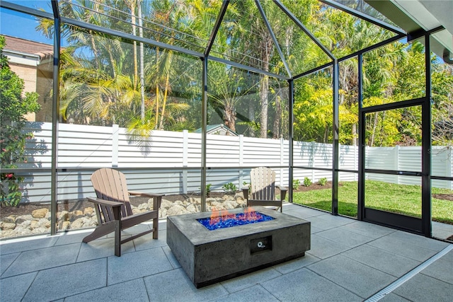5103 Windward Ave, Sarasota, FL 34242 - sunroom with an outdoor fire pit
