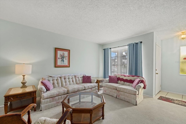 living area with a textured ceiling and carpet