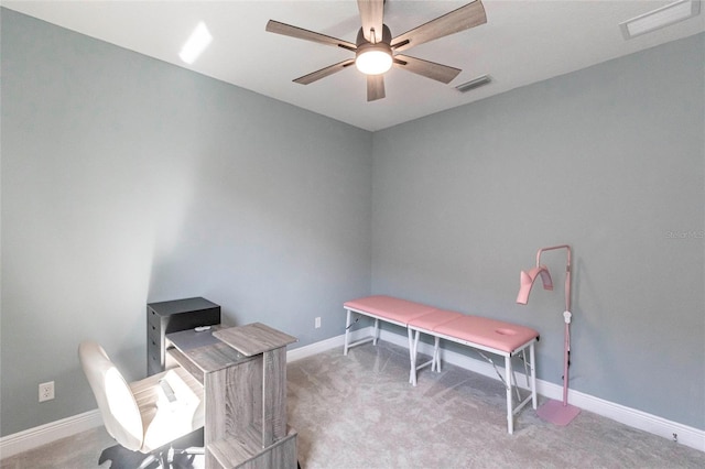 office with ceiling fan, carpet flooring, visible vents, and baseboards