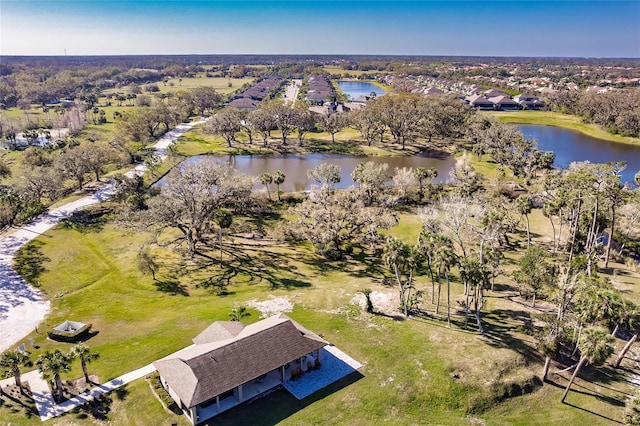 drone / aerial view with a water view