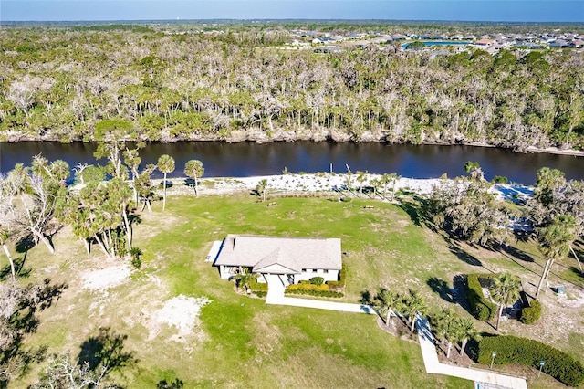 bird's eye view featuring a water view and a forest view