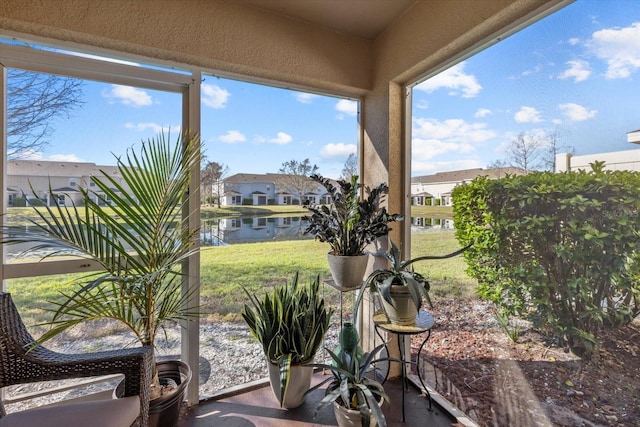 sunroom with a residential view