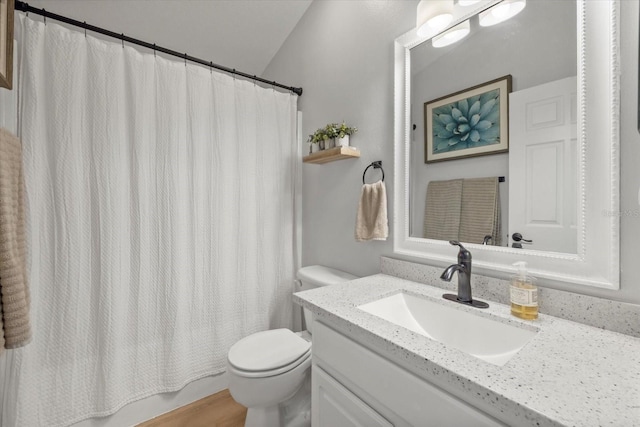 full bath featuring shower / bath combination with curtain, vanity, and toilet