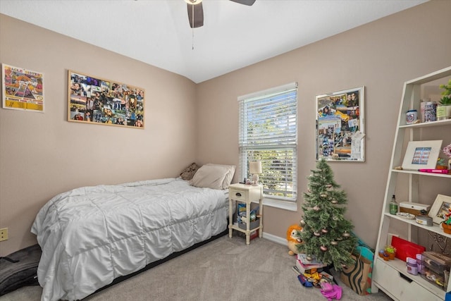 bedroom featuring carpet floors, baseboards, and a ceiling fan