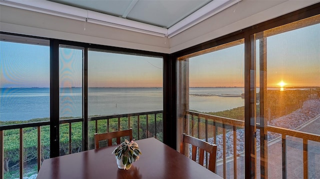 sunroom with a water view