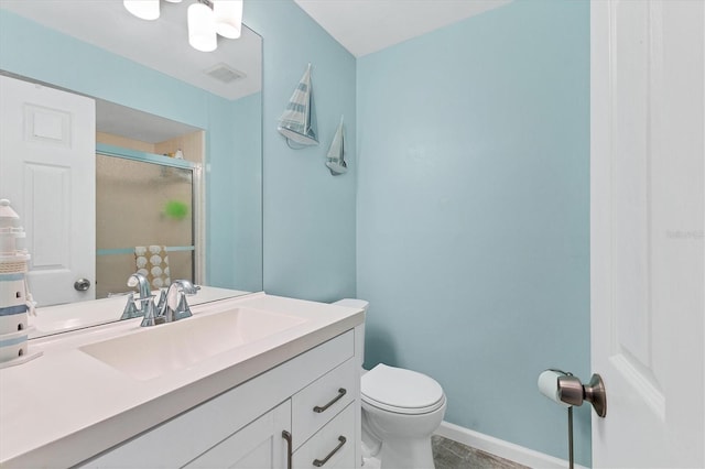 full bathroom with toilet, visible vents, vanity, baseboards, and a shower stall