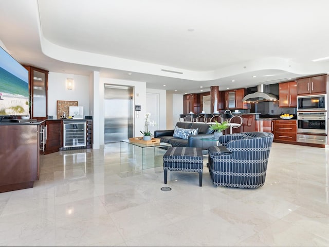 534 Beach Rd, Sarasota, FL 34242 - living room with elevator, beverage cooler, marble finish floor, and indoor bar