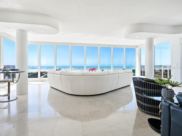 534 Beach Rd, Sarasota, FL 34242 - living area with a wall of windows and a water view