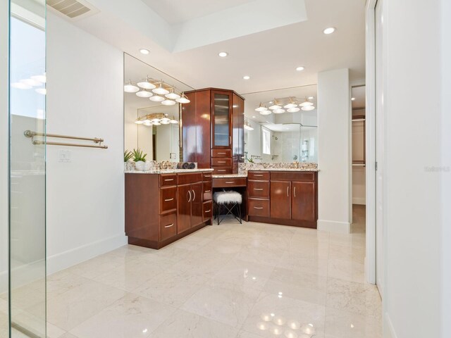534 Beach Rd, Sarasota, FL 34242 - full bath with two vanities, recessed lighting, visible vents, and walk in shower
