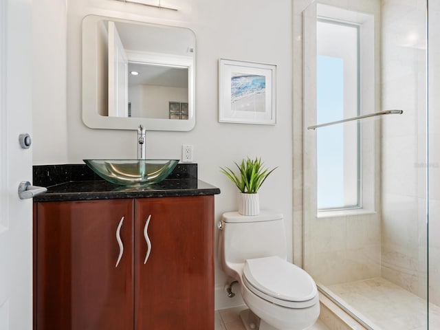 534 Beach Rd, Sarasota, FL 34242 - full bath with a tile shower, toilet, and vanity