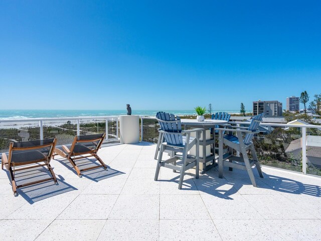 534 Beach Rd, Sarasota, FL 34242 - view of patio featuring a water view