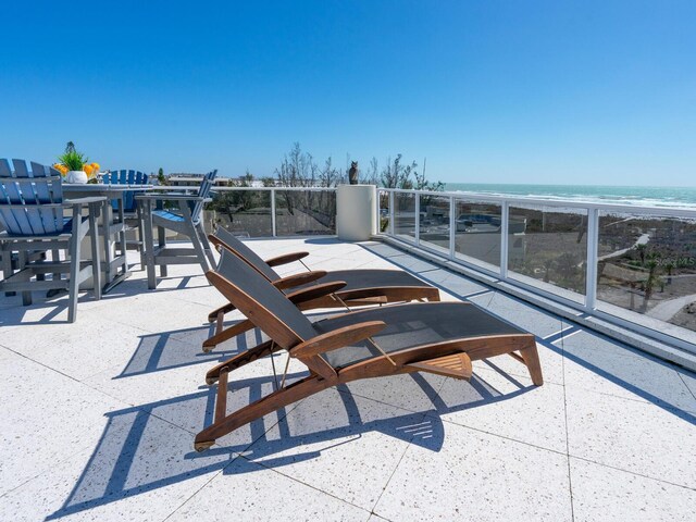 534 Beach Rd, Sarasota, FL 34242 - view of patio / terrace featuring a beach view and a water view