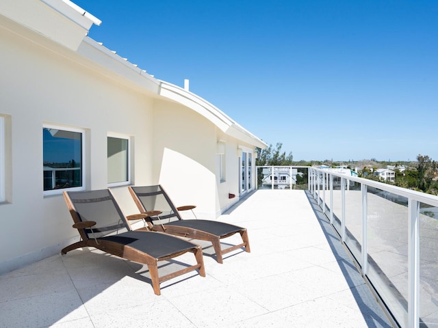 534 Beach Rd, Sarasota, FL 34242 - view of patio / terrace featuring a balcony