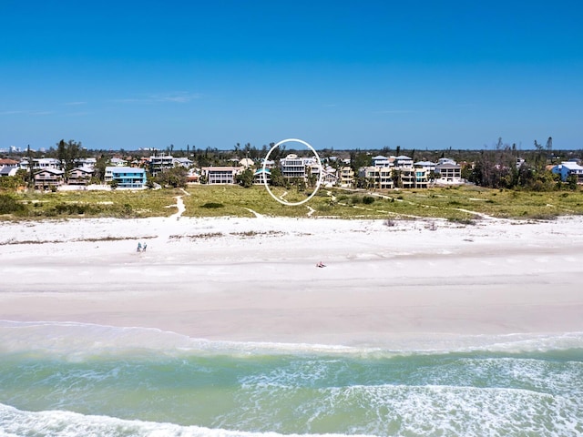 534 Beach Rd, Sarasota, FL 34242 - drone / aerial view with a water view and a beach view