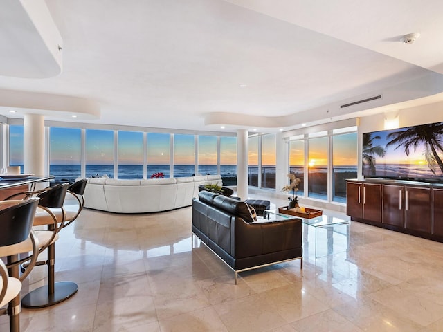534 Beach Rd, Sarasota, FL 34242 - living area with visible vents and expansive windows