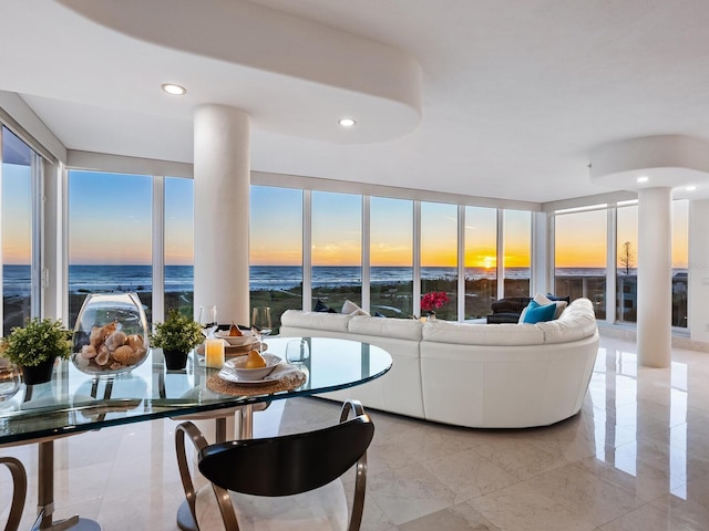 534 Beach Rd, Sarasota, FL 34242 - living room with recessed lighting, a water view, and marble finish floor