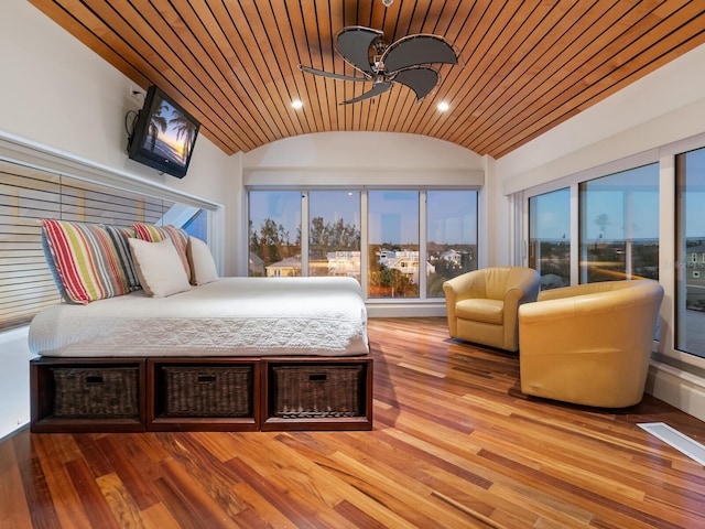 534 Beach Rd, Sarasota, FL 34242 - bedroom with hardwood / wood-style floors, vaulted ceiling, wood ceiling, and recessed lighting