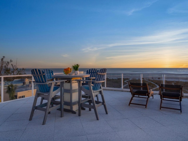 534 Beach Rd, Sarasota, FL 34242 - view of patio / terrace with a water view and outdoor dining space