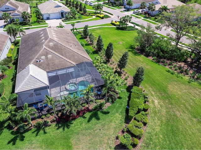 birds eye view of property with a residential view