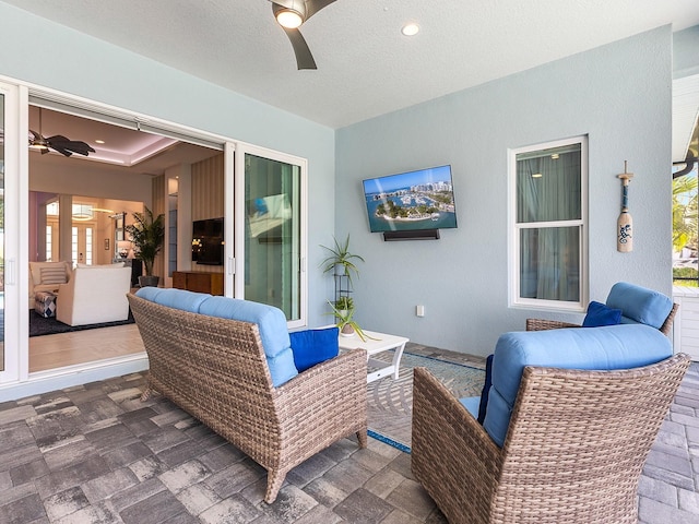 view of patio / terrace featuring a ceiling fan