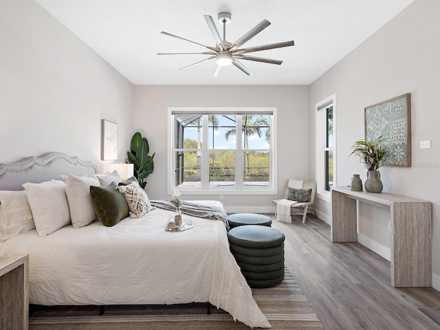 813 Tailwind Pl, Sarasota, FL 34240 - bedroom featuring wood finished floors, baseboards, and ceiling fan