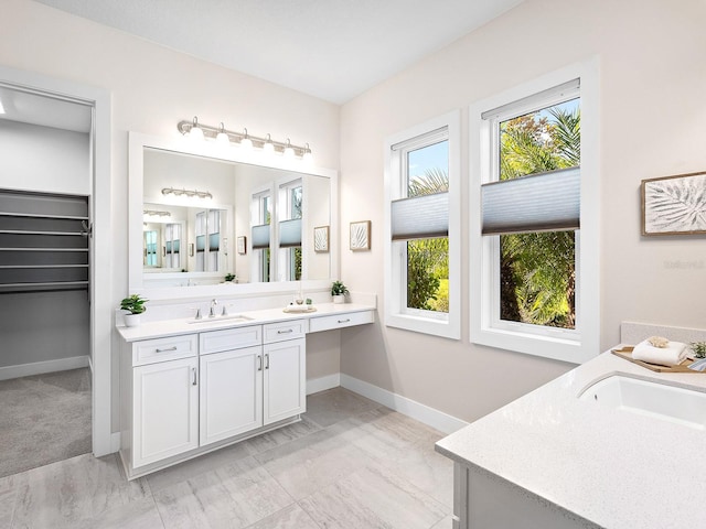 813 Tailwind Pl, Sarasota, FL 34240 - bathroom with vanity and baseboards