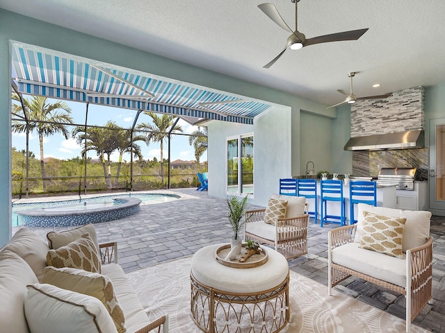 813 Tailwind Pl, Sarasota, FL 34240 - view of patio / terrace featuring outdoor lounge area, ceiling fan, a pool with connected hot tub, and glass enclosure