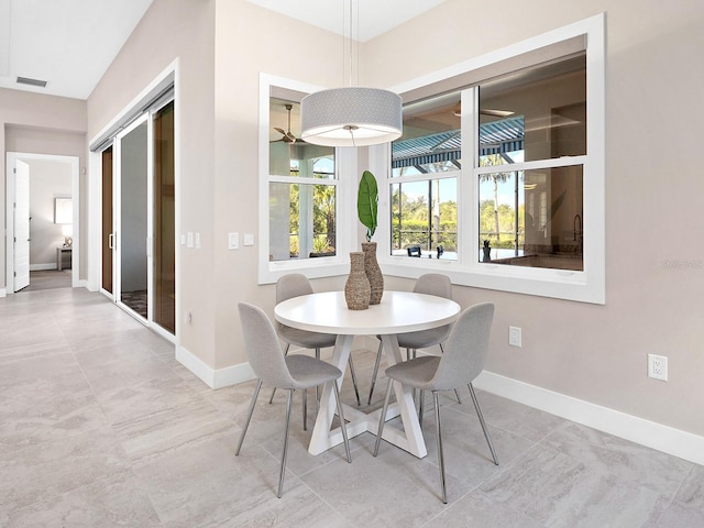 813 Tailwind Pl, Sarasota, FL 34240 - dining room with baseboards