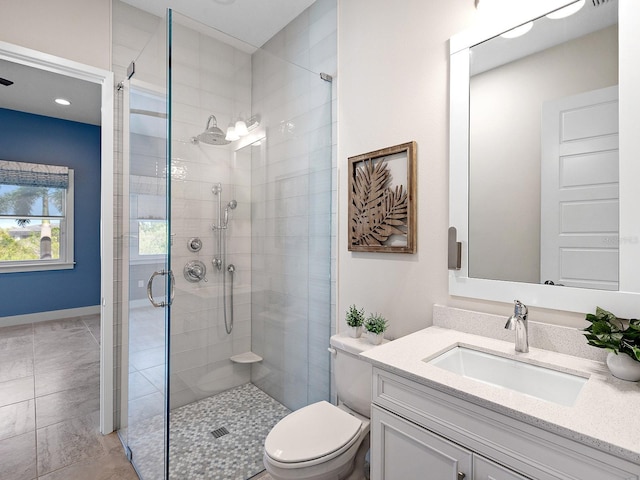 813 Tailwind Pl, Sarasota, FL 34240 - full bath with a stall shower, vanity, toilet, and baseboards