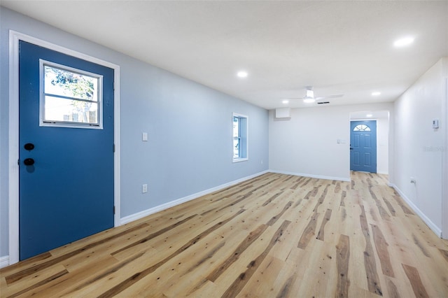 foyer entrance featuring recessed lighting, a ceiling fan, baseboards, and light wood finished floors