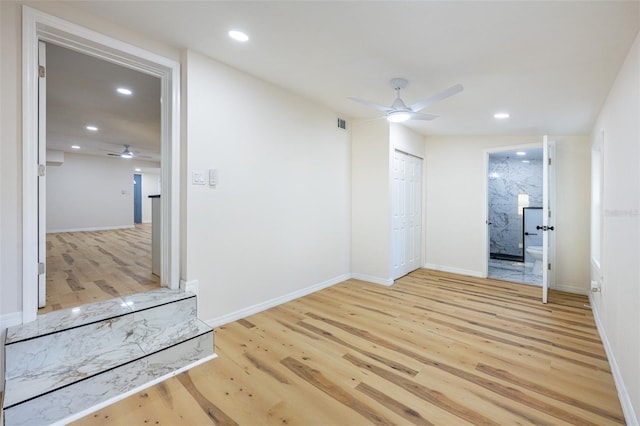 empty room featuring a ceiling fan, recessed lighting, and wood finished floors