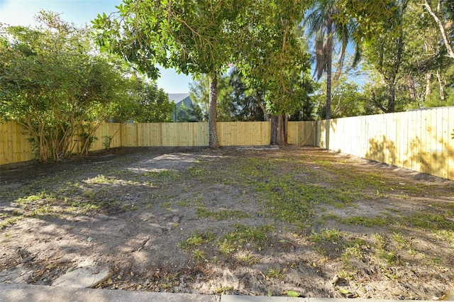 view of yard featuring a fenced backyard