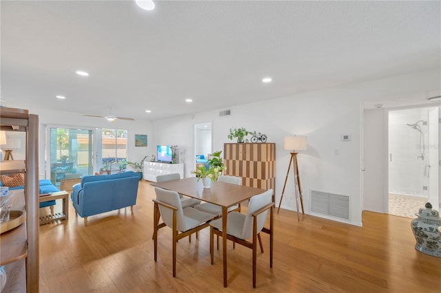 dining area with recessed lighting, baseboards, visible vents, and light wood finished floors