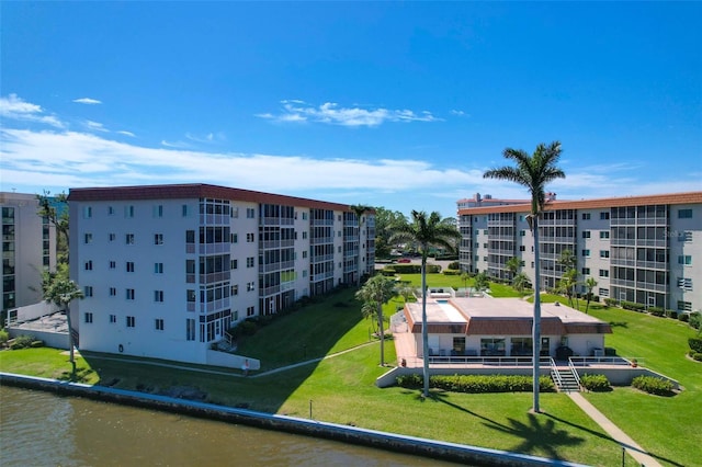 view of property with a water view