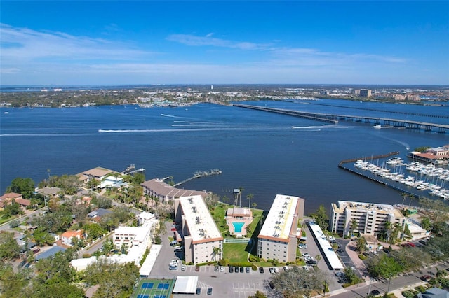 birds eye view of property with a water view