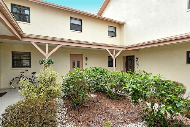 exterior space featuring stucco siding