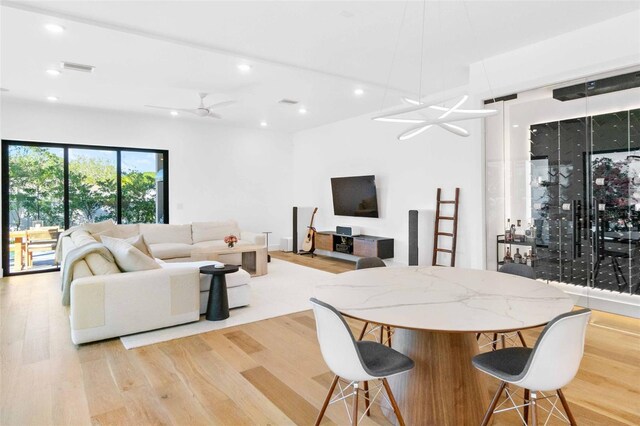 interior space with recessed lighting, visible vents, ceiling fan, and light wood finished floors