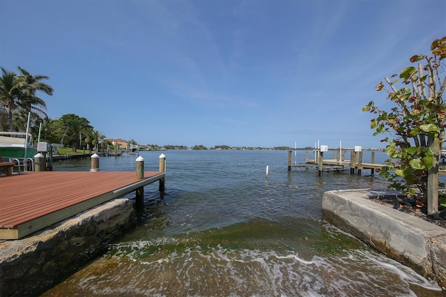 dock area featuring a water view and boat lift