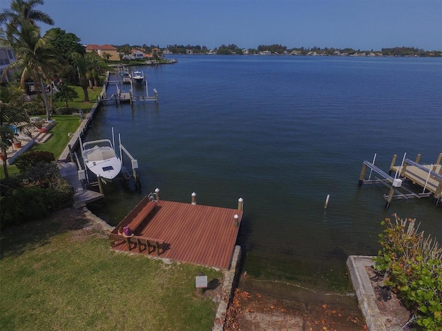 view of dock with a water view and boat lift