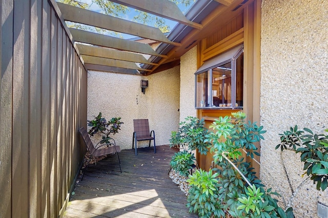 view of patio with a pergola and a wooden deck