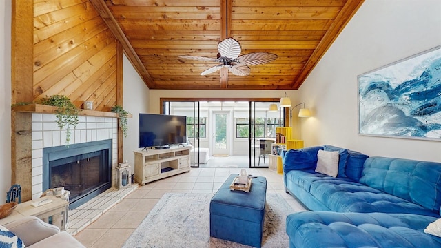 living area with ornamental molding, tile patterned flooring, a tile fireplace, vaulted ceiling, and wooden ceiling